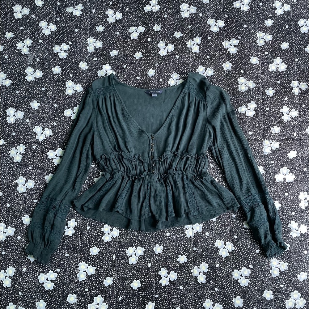 Green ruffle blouse